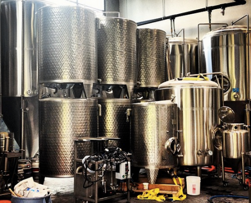 Vancouver Brewery Tours Inc. -Deep Cove Brewers Brewhouse and fermentation tanks